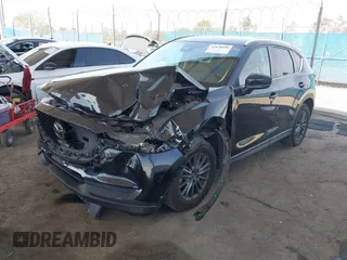 2020 Mazda CX-5 Touring with VIN JM3KFACM0L0804998, listed as a IAAI auction lot 41850998 with 44,519 mi miles. Bid and sale history available at carsss.com. Image 2.