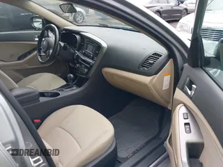 2014 Kia Optima LX with VIN KNAGM4AD7E5075815, listed as a IAAI auction lot 42669294 with 95,036 mi miles and . Bid and sale history available at DreamBid. Image 5.