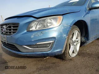 2014 Volvo S60 T5 z VIN YV1612FH1E2274829, wystawiony jako IAAI lot #41712251 z przebiegiem 87 269 mil mil oraz . Historia ofert i sprzedaży dostępna na DreamBid. Obrazek 6.