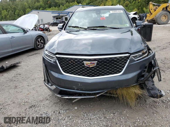 2020 Cadillac XT6 AWD Premium Luxury with VIN 1GYKPFRS1LZ148342, listed as a Copart auction lot 73495264 with 100,702 mi miles and Salvage Title. Bid and sale history available at carsss.com. Image 5.