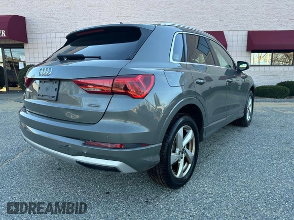 2021 Audi Q3 Premium z VIN WA1AUCF3XM1102363, wystawiony jako Copart lot #58672195 z przebiegiem 208 956 mil mil oraz Czysty tytuł • Clean title. Historia ofert i sprzedaży dostępna na DreamBid. Obrazek 4.