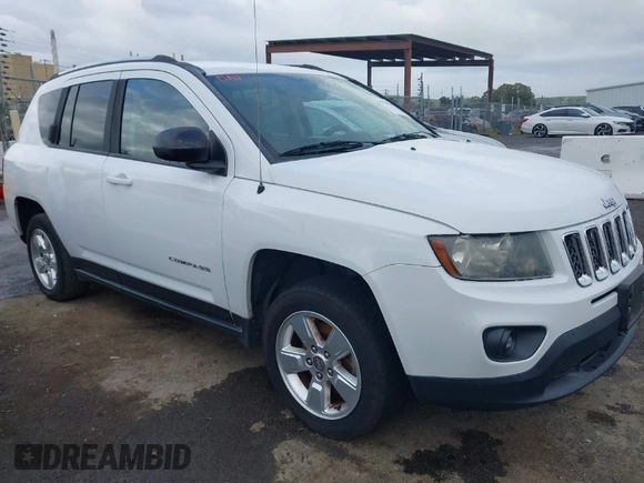 2014 Jeep Compass Altitude with VIN 1C4NJCBA8ED606589, listed as a IAAI auction lot 41939914 with 148,281 mi miles. Bid and sale history available at carsss.com. Image 1.