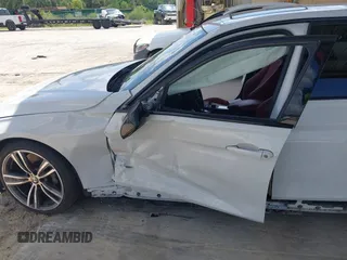 2015 BMW 3 Series 335i with VIN WBA3A9C57FK472521, listed as a IAAI auction lot 42672174 with Not provided miles and . Bid and sale history available at DreamBid. Image 6.