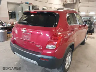2015 Chevrolet Trax LT with VIN KL7CJRSB6FB063787, listed as a IAAI auction lot 41858467 with 134,342 mi miles. Bid and sale history available at carsss.com. Image 4.