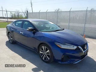 2020 Nissan Maxima SV z VIN 1N4AA6CV9LC375230, wystawiony jako IAAI lot #41851929 z przebiegiem 99 239 mil mil oraz . Historia ofert i sprzedaży dostępna na DreamBid. Obrazek 1.