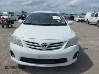 2013 Toyota Corolla L with VIN 5YFBU4EE1DP090957, listed as a IAAI auction lot 41898057 with 127,438 mi miles and . Bid and sale history available at DreamBid. Image 6.
