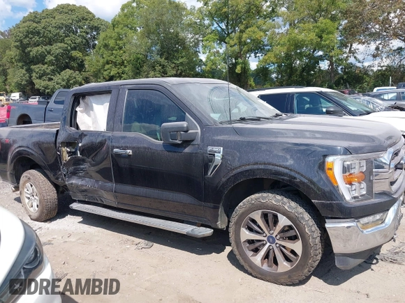 2021 Ford F-150 XL with VIN 1FTFW1E5XMKE21429, listed as a IAAI auction lot 40347406 with 125,000 mi miles. Bid and sale history available at carsss.com. Image 13.