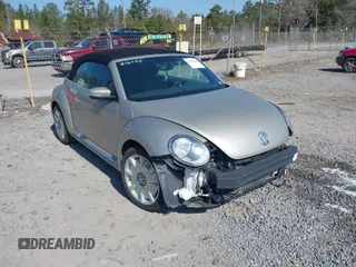 2013 Volkswagen Beetle 2.5L z VIN 3VW5X7AT9DM816045, wystawiony jako IAAI lot #41488594 z przebiegiem 51 572 mil mil oraz . Historia ofert i sprzedaży dostępna na DreamBid. Obrazek 1.