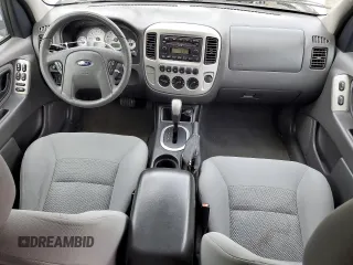 2005 Ford Escape Hybrid with VIN 1FMCU96H55KC74059, listed as a Copart auction lot 57065685 with 154,807 mi miles and Salvage title. Bid and sale history available at DreamBid. Image 8.