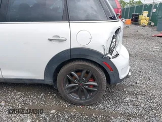 2012 MINI Countryman S z VIN WMWZC5C54CWL58610, wystawiony jako IAAI lot #42372195 z przebiegiem 133 556 mil mil oraz . Historia ofert i sprzedaży dostępna na DreamBid. Obrazek 13.