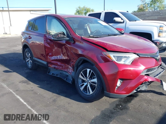 2018 Toyota RAV4 XLE with VIN JTMWFREV6JD117500, listed as a IAAI auction lot 42258588 with Not provided miles and . Bid and sale history available at DreamBid. Image 12.