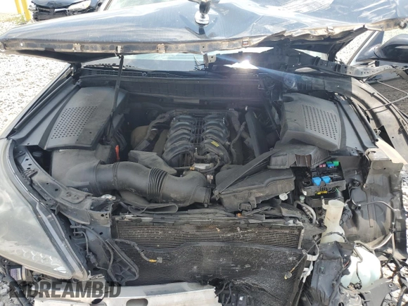 2015 Hyundai Equus Signature z VIN KMHGH4JH0FU098348, wystawiony jako Copart lot #58445284 z przebiegiem Nie podano mil oraz Szkoda całkowita • Salvage title. Historia ofert i sprzedaży dostępna na DreamBid. Obrazek 11.
