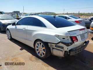 2014 Mercedes-Benz E 350 with VIN WDDKJ8JB7EF257896, listed as a IAAI auction lot 42291137 with 124,499 mi miles and . Bid and sale history available at DreamBid. Image 3.