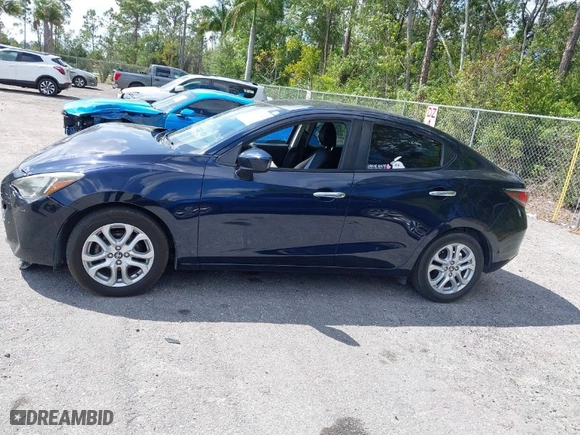 2017 Toyota Yaris iA with VIN 3MYDLBYV3HY151597, listed as a IAAI auction lot 41813004 with 90,684 mi miles. Bid and sale history available at carsss.com. Image 15.