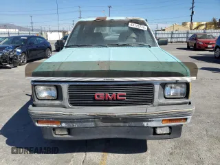 1991 GMC Jimmy z VIN 1GKCS13Z2M2518231, wystawiony jako Copart lot #64115274 z przebiegiem 132 698 mil mil oraz Czysty tytuł • Clean title. Historia ofert i sprzedaży dostępna na DreamBid. Obrazek 5.