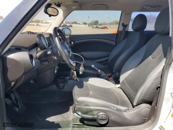 2009 MINI Cooper Hardtop with VIN WMWMF33579TU72374, listed as a Copart auction lot 50092815 with 127,140 mi miles and Salvage Title. Bid and sale history available at carsss.com. Image 7.