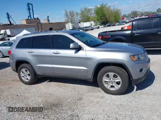 2016 Jeep Grand Cherokee Laredo z VIN 1C4RJFAG0GC384227, wystawiony jako IAAI lot #41995947 z przebiegiem 155 276 mil mil oraz . Historia ofert i sprzedaży dostępna na DreamBid. Obrazek 13.