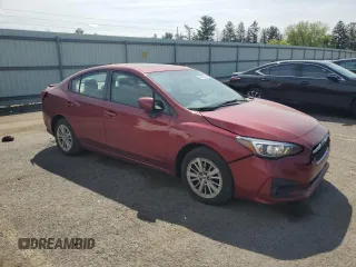 2017 Subaru Impreza Premium with VIN 4S3GKAD66H3619998, listed as a Copart auction lot 55403315 with 182,099 mi miles and Salvage title. Bid and sale history available at DreamBid. Image 4.