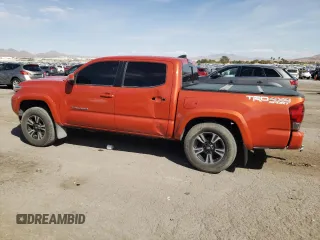2017 Toyota Tacoma SR5 z VIN 3TMCZ5AN1HM096157, wystawiony jako Copart lot #74628764 z przebiegiem 91 998 mil mil oraz Szkoda całkowita • Salvage title. Historia ofert i sprzedaży dostępna na DreamBid. Obrazek 2.