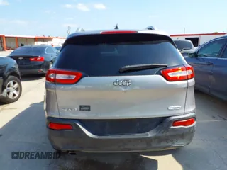 2014 Jeep Cherokee Latitude with VIN 1C4PJMCB4EW315520, listed as a IAAI auction lot 42034989 with 215,758 mi miles and . Bid and sale history available at DreamBid. Image 16.