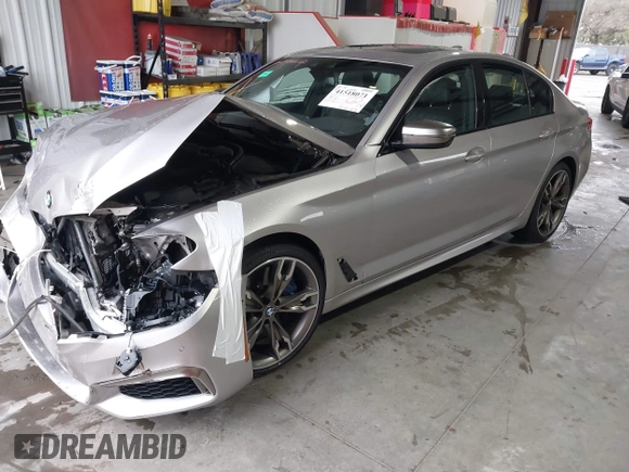 2020 BMW 5 Series M550i xDrive z VIN WBAJS7C07LCD85532, wystawiony jako IAAI lot #41518071 z przebiegiem 57 645 mil mil oraz . Historia ofert i sprzedaży dostępna na DreamBid. Obrazek 21.