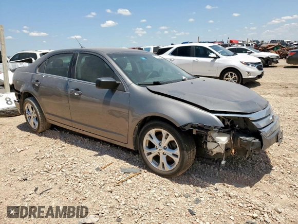 2012 Ford Fusion SE with VIN 3FAHP0HA9CR435931, listed as a Copart auction lot 61633525 with 169,561 mi miles and Salvage title. Bid and sale history available at DreamBid. Image 4.