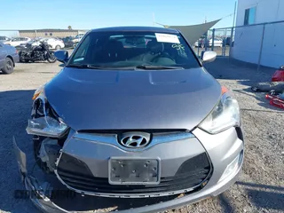 2017 Hyundai Veloster with VIN KMHTC6AD9HU323472, listed as a IAAI auction lot 41865974 with 94,692 mi miles. Bid and sale history available at carsss.com. Image 12.