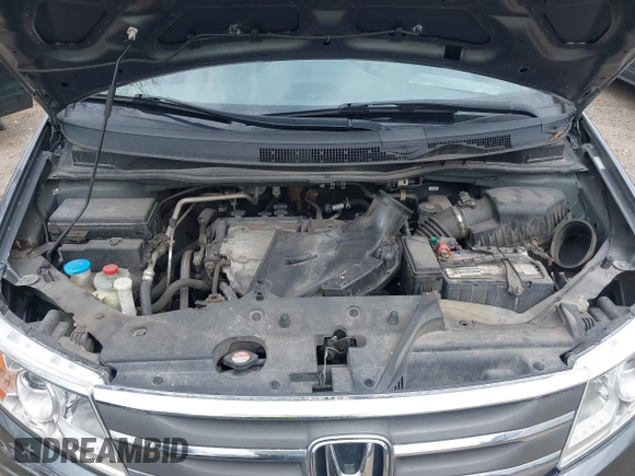 2012 Honda Odyssey Touring with VIN 5FNRL5H99CB028304, listed as a IAAI auction lot 42031916 with 216,185 mi miles and . Bid and sale history available at DreamBid. Image 10.