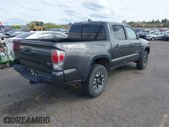 2020 Toyota Tacoma SR5 with VIN 3TMCZ5AN7LM321061, listed as a IAAI auction lot 41985533 with 32,111 mi miles and . Bid and sale history available at DreamBid. Image 4.