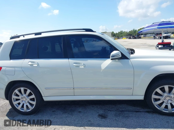2012 Mercedes-Benz GLK GLK 350 with VIN WDCGG5GB8CF735979, listed as a IAAI auction lot 41931333 with 124,649 mi miles. Bid and sale history available at carsss.com. Image 13.
