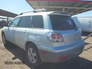 2003 Mitsubishi Outlander XLS with VIN JA4LX41G73U044032, listed as a IAAI auction lot 41794058 with 285,734 mi miles. Bid and sale history available at carsss.com. Image 3.