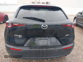 2024 Mazda CX-30 S Select Sport with VIN 3MVDMBBM3RM700797, listed as a IAAI auction lot 42686898 with 23,170 mi miles and . Bid and sale history available at DreamBid. Image 16.
