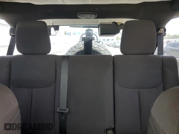 2013 Jeep Wrangler Unlimited Sport with VIN 1C4BJWDG0DL560265, listed as a Copart auction lot 58444045 with 111,354 mi miles and Salvage title. Bid and sale history available at DreamBid. Image 10.