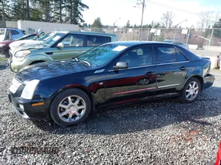 2005 Cadillac STS with VIN 1G6DW677250190268, listed as a IAAI auction lot 41702798 with 142,427 mi miles. Bid and sale history available at carsss.com. Image 14.