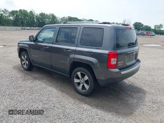 2016 Jeep Patriot Latitude with VIN 1C4NJRFB9GD523102, listed as a IAAI auction lot 42598712 with 144,808 mi miles and . Bid and sale history available at DreamBid. Image 3.