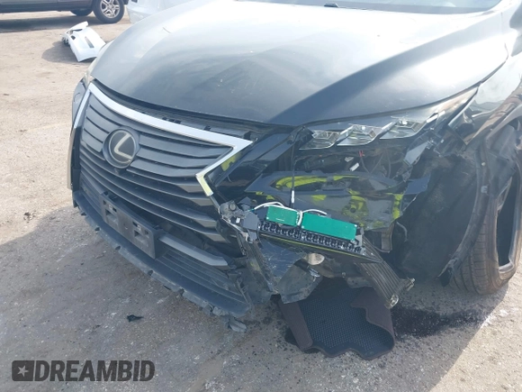 2017 Lexus RX 350 with VIN 2T2ZZMCA5HC054612, listed as a IAAI auction lot 42361443 with 87,960 mi miles and . Bid and sale history available at DreamBid. Image 6.