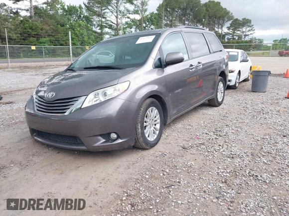 2016 Toyota Sienna XLE with VIN 5TDYK3DC8GS721290, listed as a IAAI auction lot 42127035 with 142,150 mi miles and . Bid and sale history available at DreamBid. Image 2.