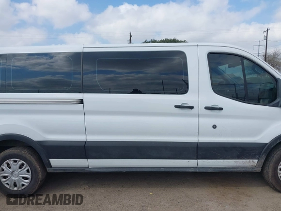 2019 Ford Transit Passenger XL with VIN 1FBZX2YM5KKA48112, listed as a IAAI auction lot 41518013 with 163,856 mi miles and . Bid and sale history available at DreamBid. Image 14.