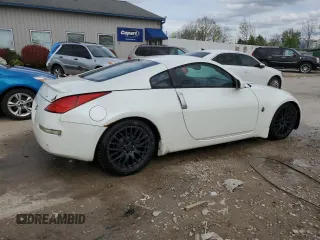 2003 Nissan 350Z Touring z VIN JN1AZ34E43T012305, wystawiony jako Copart lot #53831675 z przebiegiem 201 095 mil mil oraz Nie do naprawy • Non repairable. Historia ofert i sprzedaży dostępna na DreamBid. Obrazek 3.