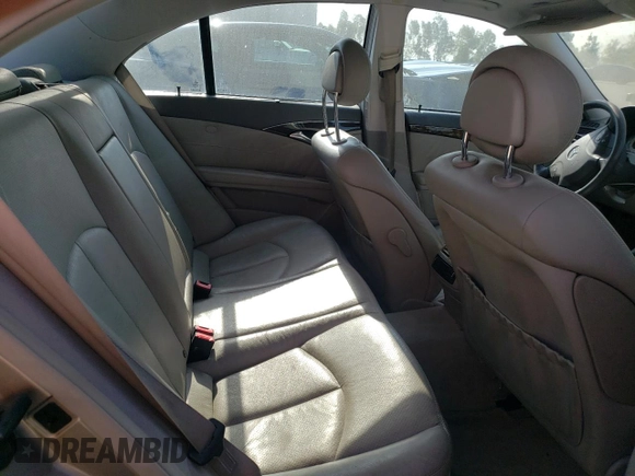 2005 Mercedes-Benz E 5.0L with VIN WDBUF70J75A693702, listed as a Copart auction lot 63497604 with 122,410 mi miles and Clean Title. Bid and sale history available at carsss.com. Image 10.