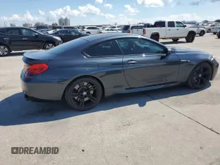 2016 BMW M6 z VIN WBS6J9C59GD934530, wystawiony jako Copart lot #72057354 z przebiegiem 46 549 mil mil oraz Nie do naprawy. Historia ofert i sprzedaży dostępna na DreamBid. Obrazek 2.