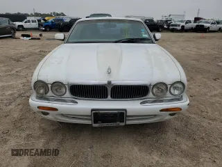 1998 Jaguar XJ with VIN SAJHX1248WC835728, listed as a Copart auction lot 86698244 with 116,768 mi miles and Clean title. Bid and sale history available at DreamBid. Image 5.