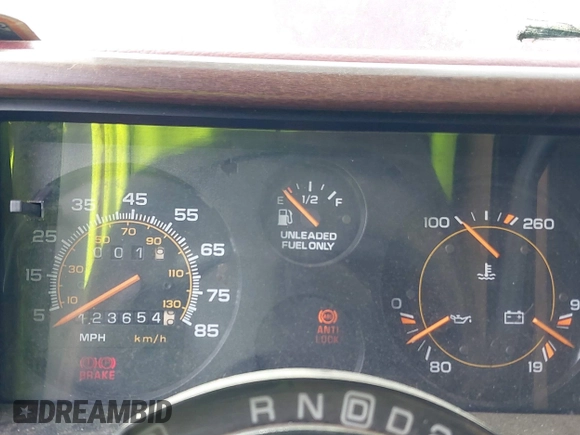 1994 Chevrolet Chevy Van z VIN 1GBEG25K4RF177057, wystawiony jako IAAI lot #42090808 z przebiegiem 123 654 mil mil oraz . Historia ofert i sprzedaży dostępna na DreamBid. Obrazek 7.