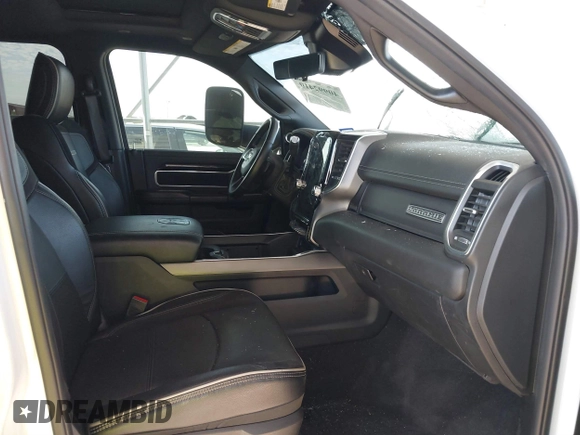 2021 Ram 2500 Laramie with VIN 3C6UR5NLXMG677847, listed as a IAAI auction lot 40992410 with 106,912 mi miles. Bid and sale history available at carsss.com. Image 5.