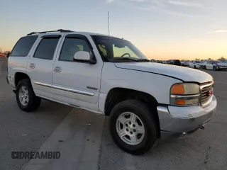 2002 GMC Yukon SLE with VIN 1GKEK13T12R143778, listed as a Copart auction lot 81387104 with 213,129 mi miles and Salvage Title. Bid and sale history available at carsss.com. Image 4.