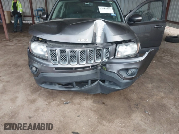 2016 Jeep Compass Latitude with VIN 1C4NJCEA2GD599833, listed as a IAAI auction lot 41507729 with 107,187 mi miles. Bid and sale history available at carsss.com. Image 6.