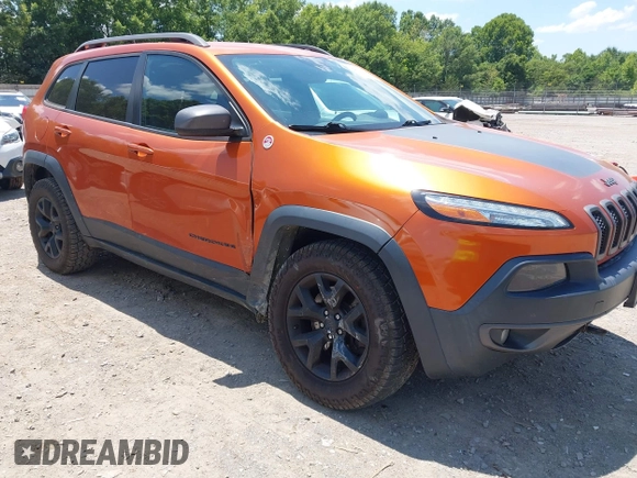 2016 Jeep Cherokee Trailhawk with VIN 1C4PJMBS6GW318035, listed as a IAAI auction lot 42652034 with 187,519 mi miles and . Bid and sale history available at DreamBid. Image 1.
