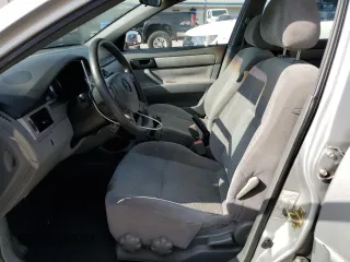 2006 Suzuki Forenza z VIN KL5JD56Z66K299816, wystawiony jako Copart lot #81893914 z przebiegiem 156 416 mil mil oraz Szkoda całkowita • Salvage title. Historia ofert i sprzedaży dostępna na DreamBid. Obrazek 7.