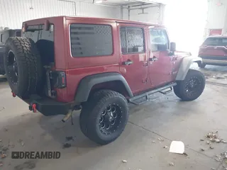 2011 Jeep Wrangler Unlimited Rubicon with VIN 1J4BA6H18BL584486, listed as a IAAI auction lot 42340661 with 152,896 mi miles and . Bid and sale history available at DreamBid. Image 4.
