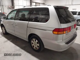 2003 Honda Odyssey EX with VIN 5FNRL18673B009670, listed as a IAAI auction lot 42130172 with 218,391 mi miles and . Bid and sale history available at DreamBid. Image 3.